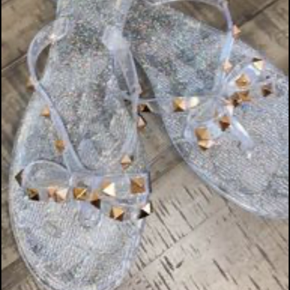 Jelly flip flops with gold studs